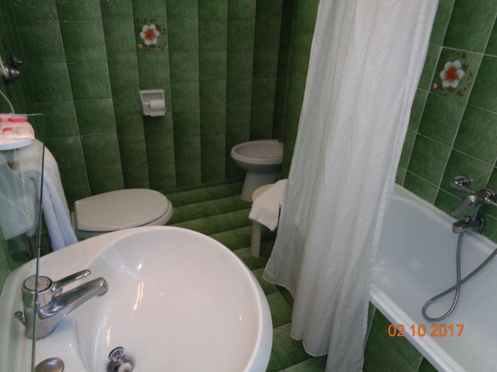 Koupelna v ubytování Hotel Ambasciatori Palace