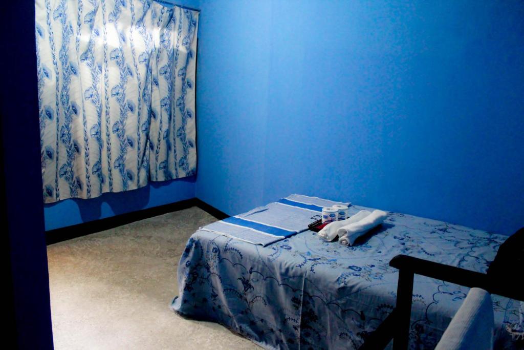 Postel nebo postele na pokoji v ubytování J hostel kandy