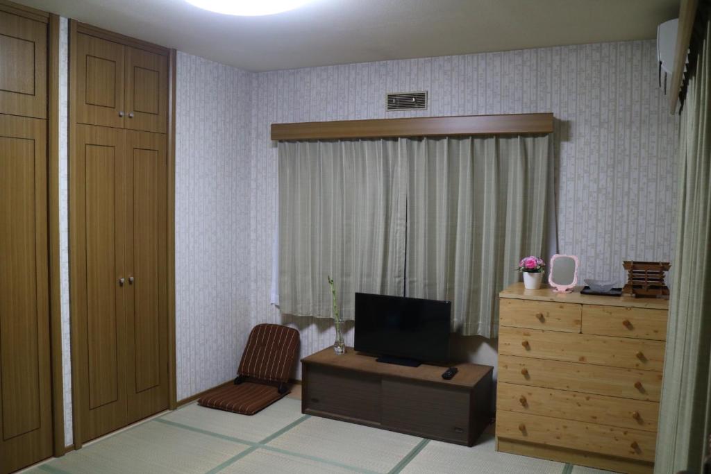 TV a/nebo společenská místnost v ubytování Hotel Otani