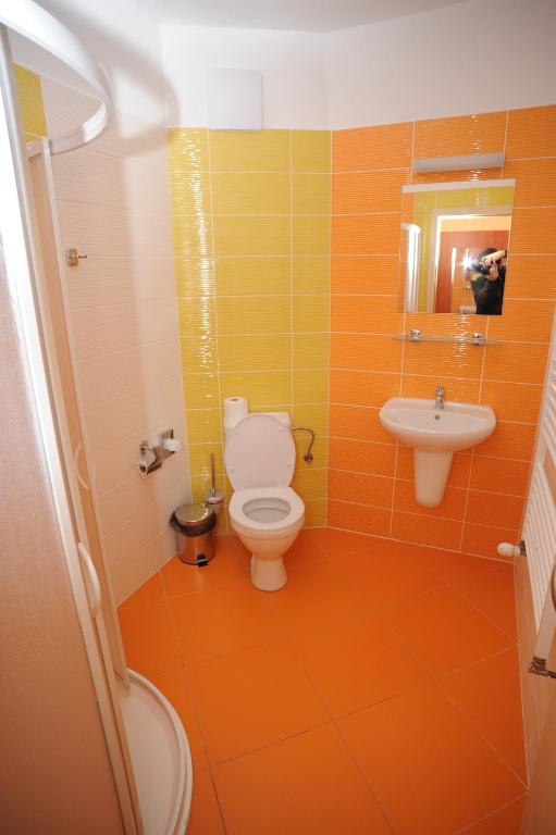 Koupelna v ubytování Hotel Olympionik