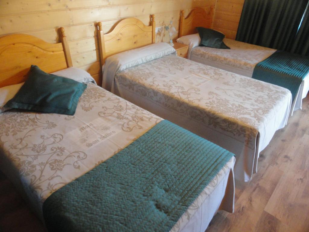 Postel nebo postele na pokoji v ubytování Motel San Isidro
