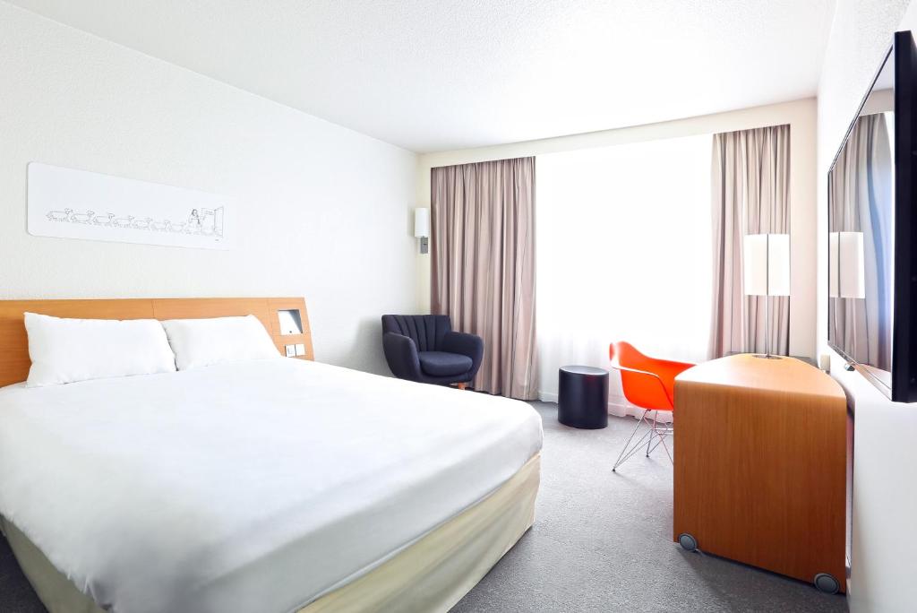 Postel nebo postele na pokoji v ubytování ibis Styles Nancy Sud