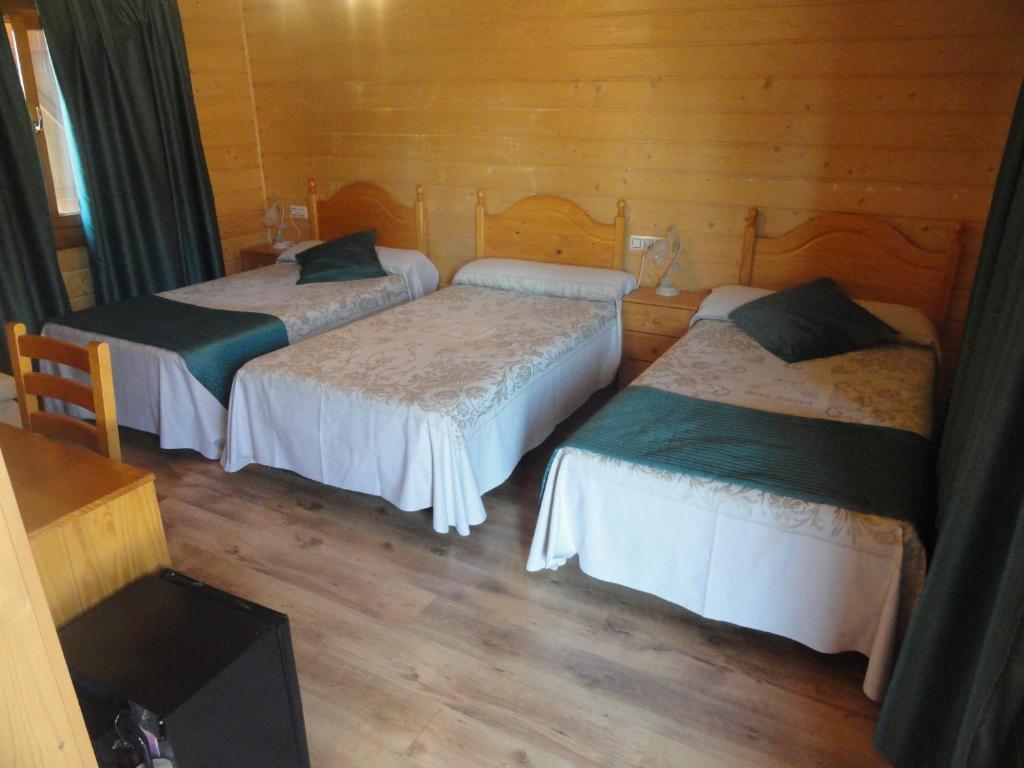 Postel nebo postele na pokoji v ubytování Motel San Isidro