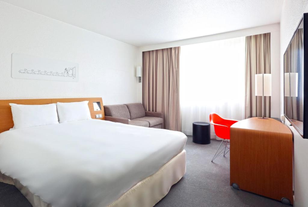Postel nebo postele na pokoji v ubytování ibis Styles Nancy Sud
