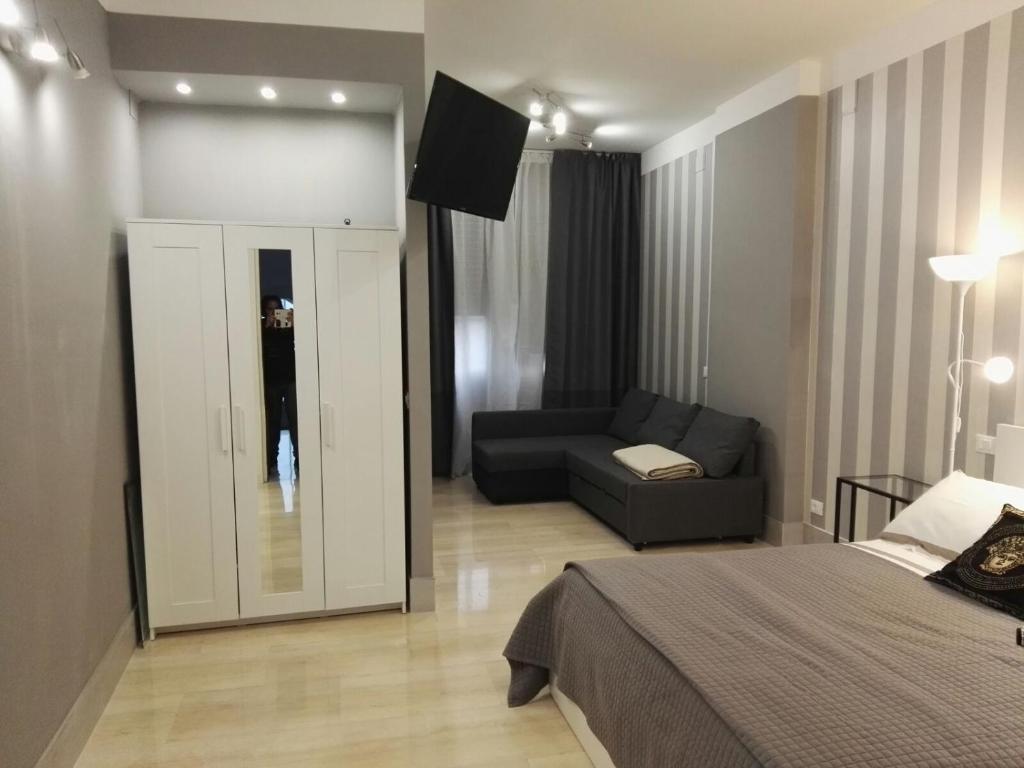 Postel nebo postele na pokoji v ubytování B&B Pescara Centro Luxury Suite