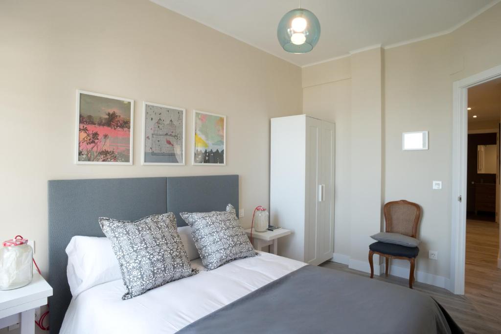Posteľ alebo postele v izbe v ubytovaní San Diego - Iberorent Apartments