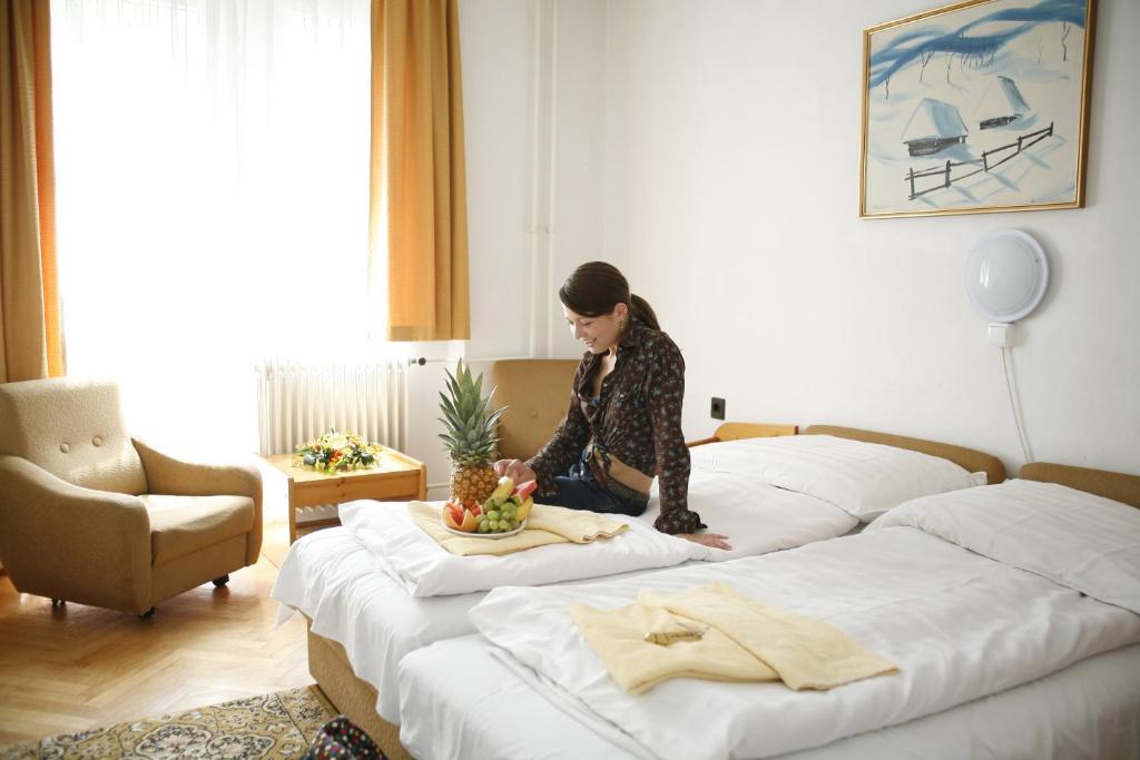 Postel nebo postele na pokoji v ubytování Hotel Bara Junior
