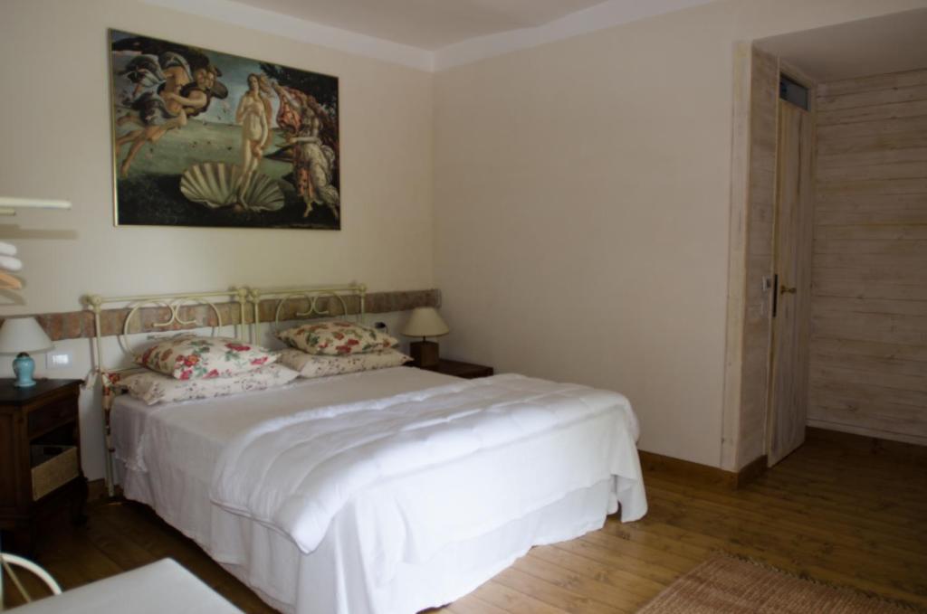 Postel nebo postele na pokoji v ubytování Al Riccio