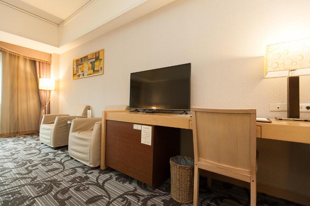 TV a/nebo společenská místnost v ubytování Hoya Hot Springs Resort & Spa