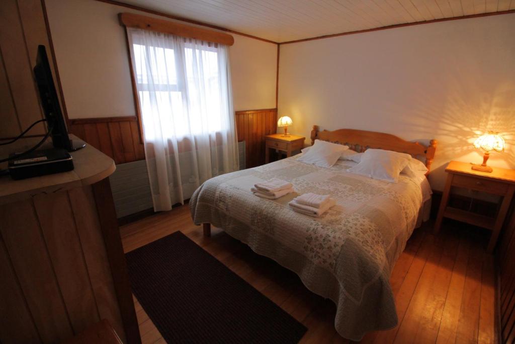 Postel nebo postele na pokoji v ubytování Hotel Mi Casa
