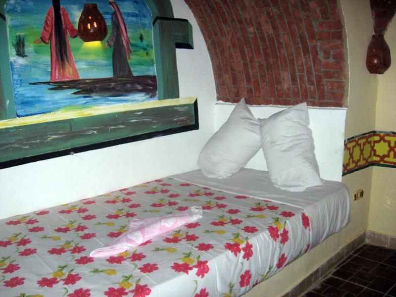Postel nebo postele na pokoji v ubytování Al Baeirat Hotel