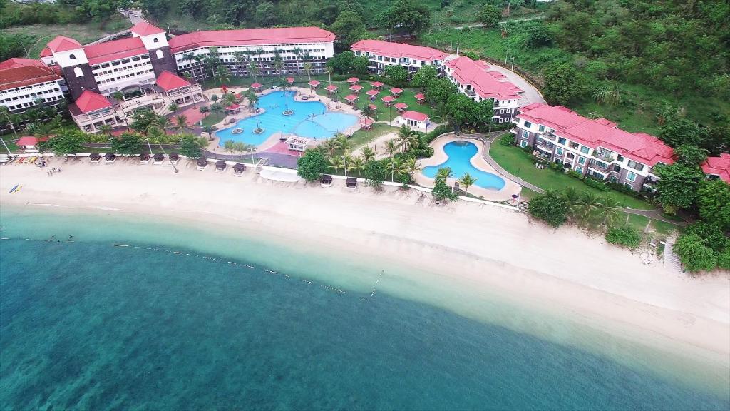 an aerial view of a resort on the beach at Canyon Cove Hotel and Spa in Nasugbu
