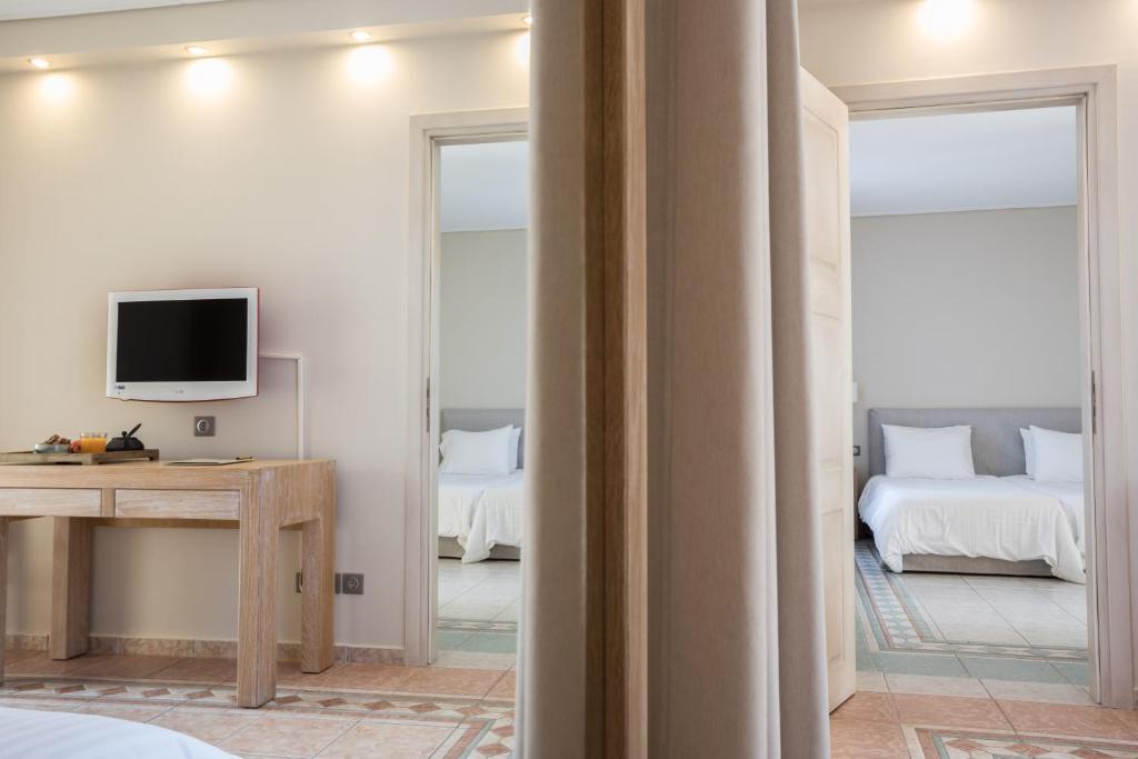 Postel nebo postele na pokoji v ubytování Porto Naxos