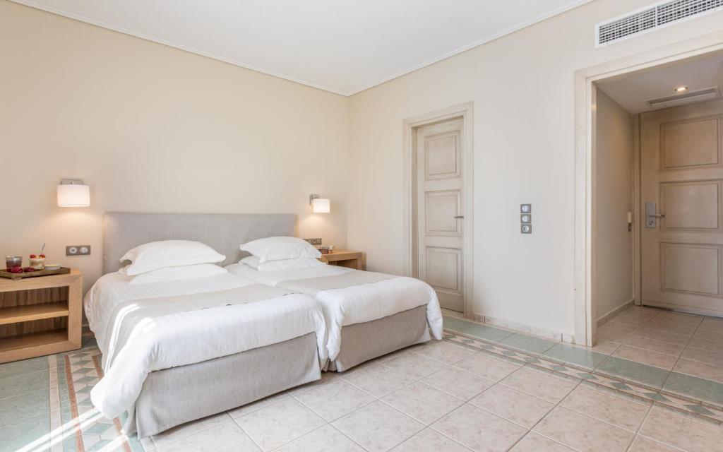 Postel nebo postele na pokoji v ubytování Porto Naxos