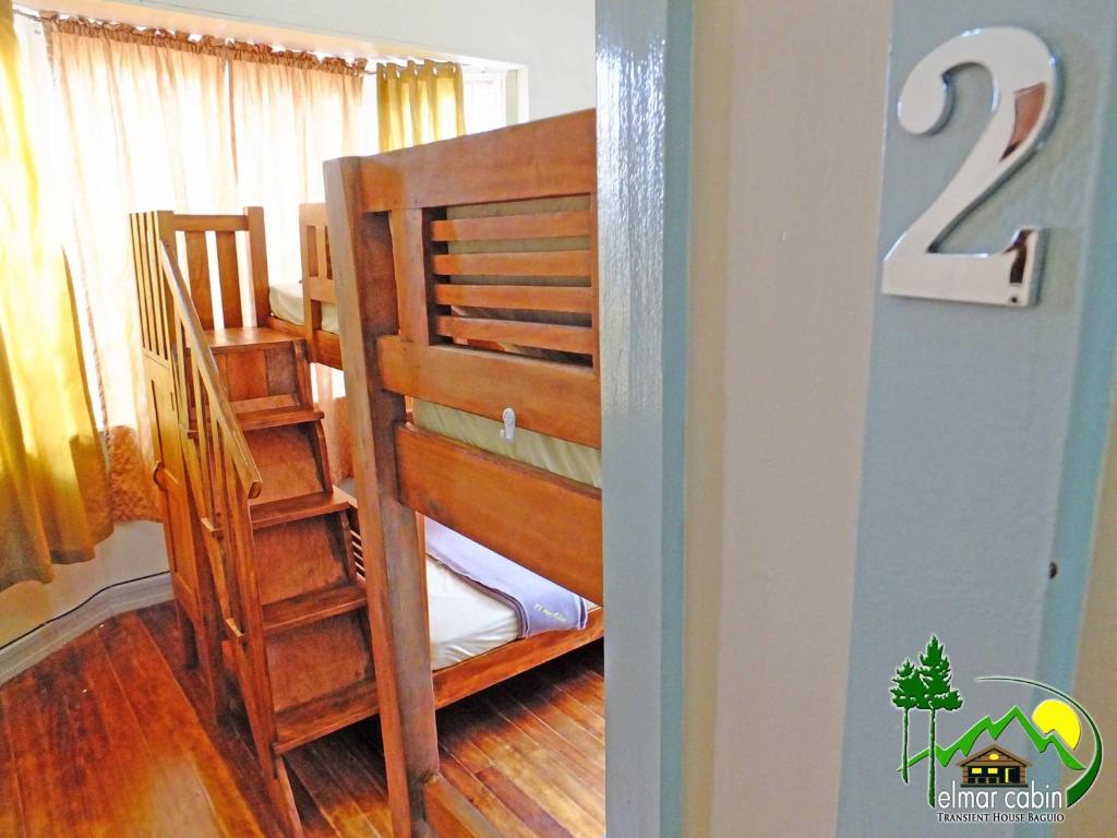 Postel nebo postele na pokoji v ubytování Elmar Cabin