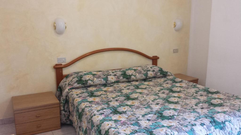 Postel nebo postele na pokoji v ubytování Albergo Ristorante Lavedo