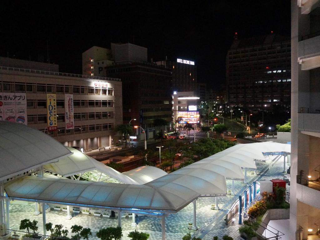 a view of a city at night with buildings at Hotel Abest Naha Kokusaidori in Naha