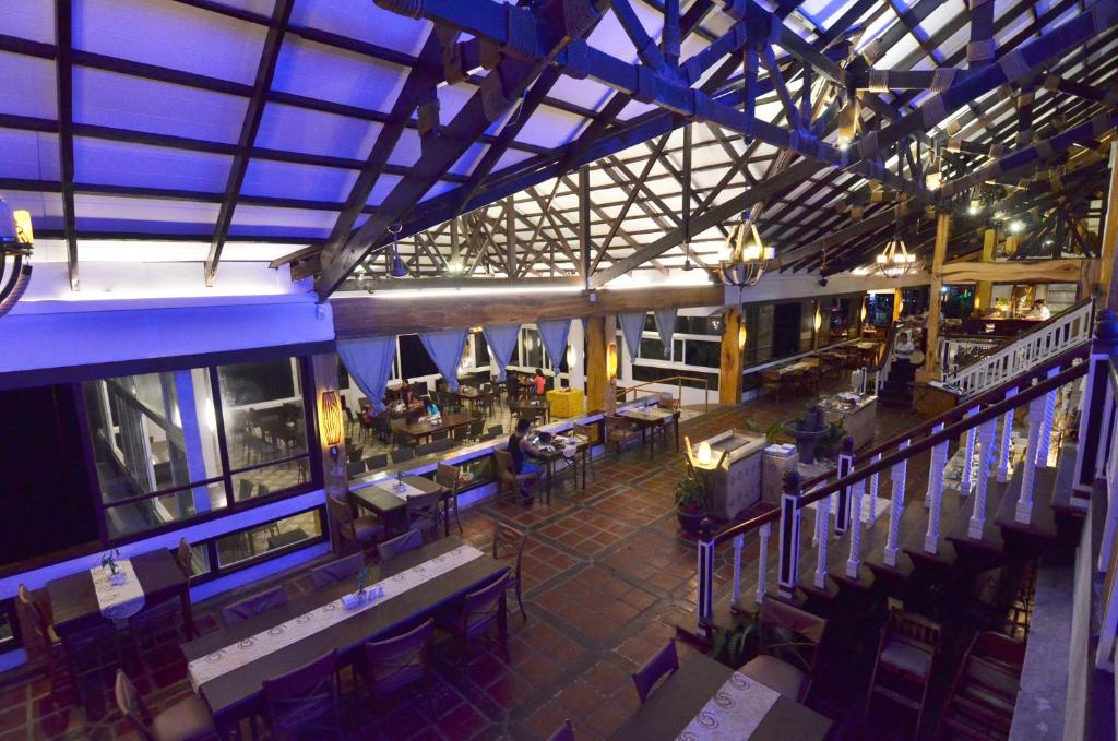 an overhead view of a restaurant with tables and chairs at Eagle Point Beach and Dive Resort in Mabini