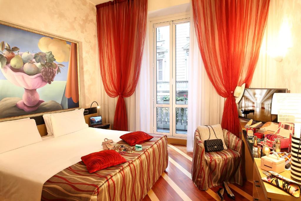 Postel nebo postele na pokoji v ubytování Hotel Sanpi Milano