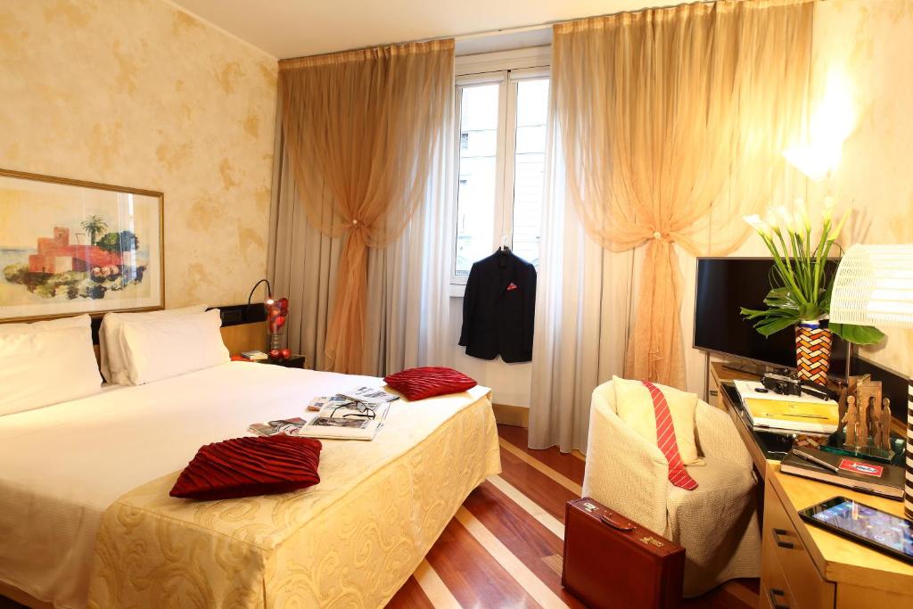 Postel nebo postele na pokoji v ubytování Hotel Sanpi Milano
