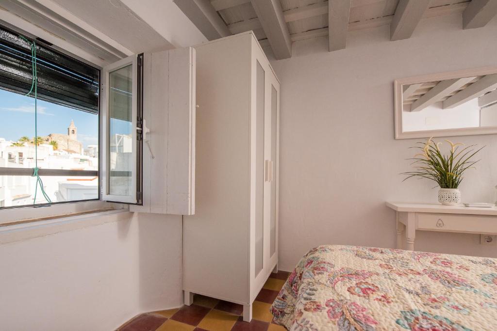 Posteľ alebo postele v izbe v ubytovaní Casa Calle Alta