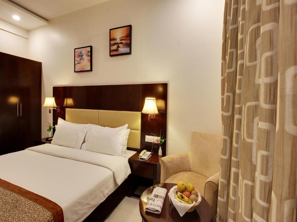 Postel nebo postele na pokoji v ubytování Hotel Sai Jashan Shirdi - Where blessings & comfort meet