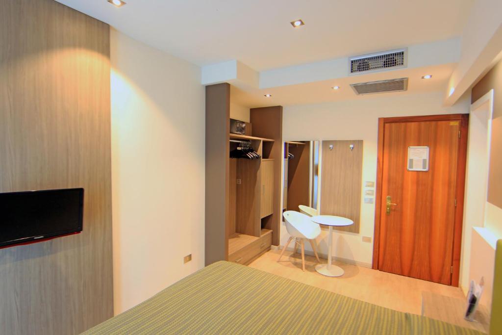 TV a/nebo společenská místnost v ubytování Hotel Ideal