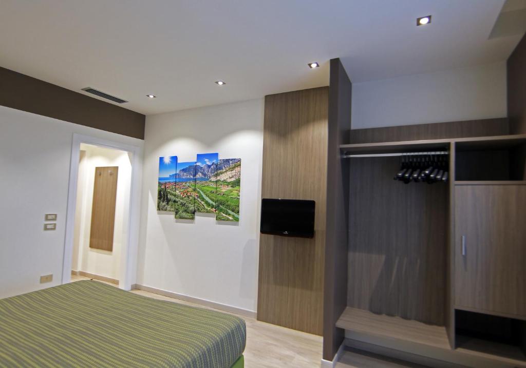 Postel nebo postele na pokoji v ubytování Hotel Ideal