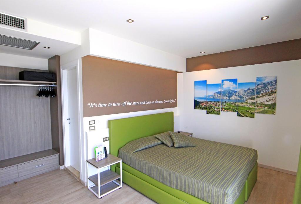 Postel nebo postele na pokoji v ubytování Hotel Ideal
