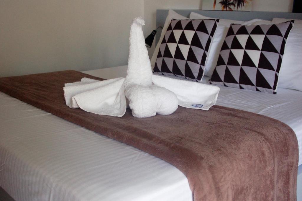 Postel nebo postele na pokoji v ubytování Positano Alona Beach Panglao
