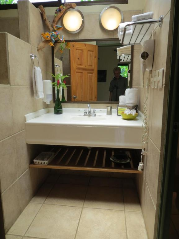 Kuchyň nebo kuchyňský kout v ubytování Pura Vida Hotel
