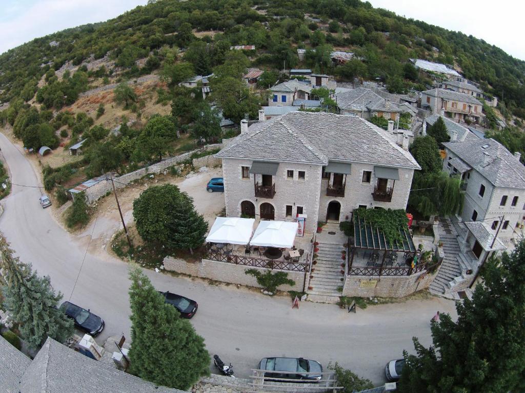 an aerial view of a large house on a hill at Matzato in Monodendri