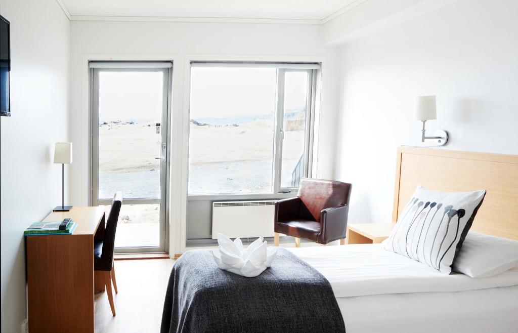 Postel nebo postele na pokoji v ubytování Fosshotel Nupar