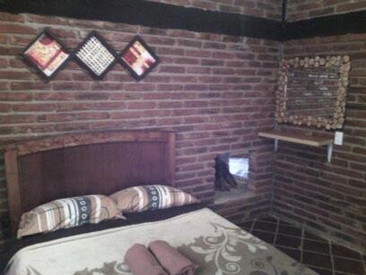 Postel nebo postele na pokoji v ubytování Cabanas Sierra Nublada