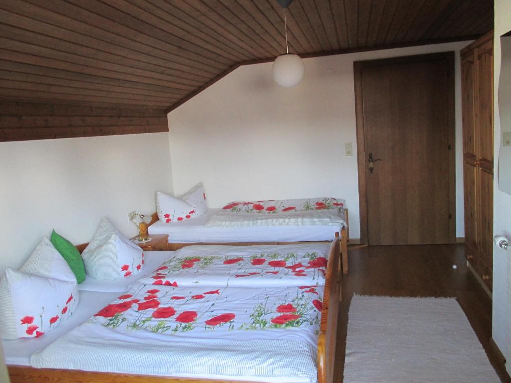 Postel nebo postele na pokoji v ubytování Haus Schneider