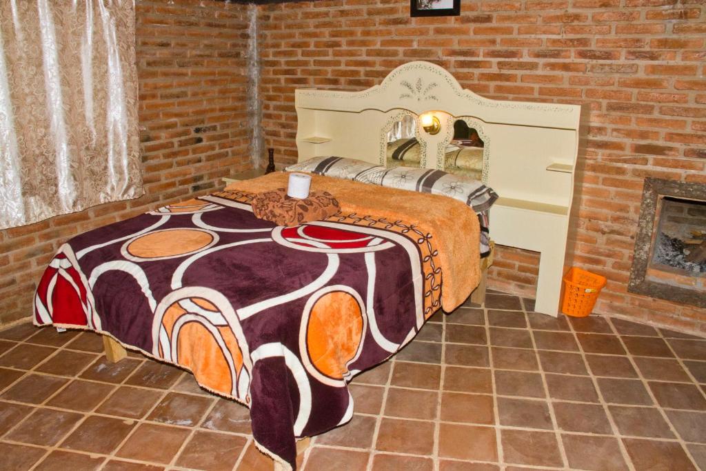 Postel nebo postele na pokoji v ubytování Cabanas Sierra Nublada