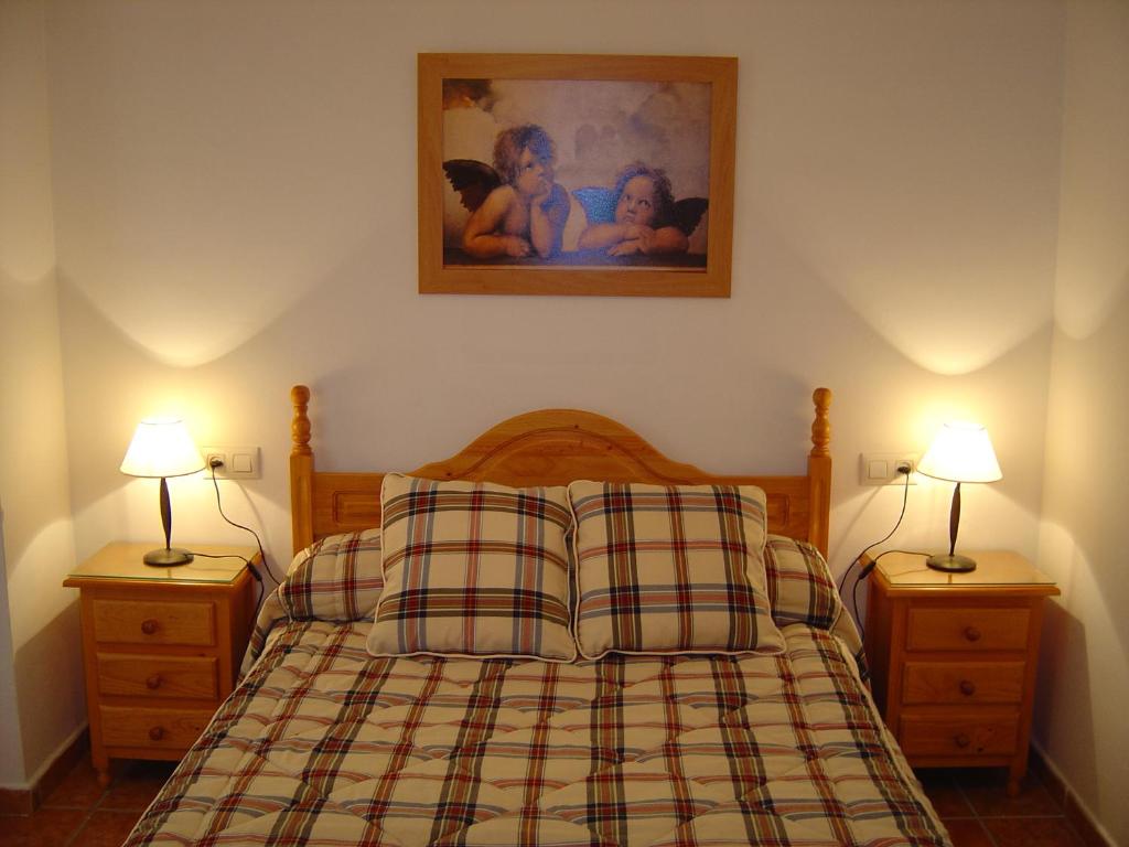 Postel nebo postele na pokoji v ubytování Casa Antonia
