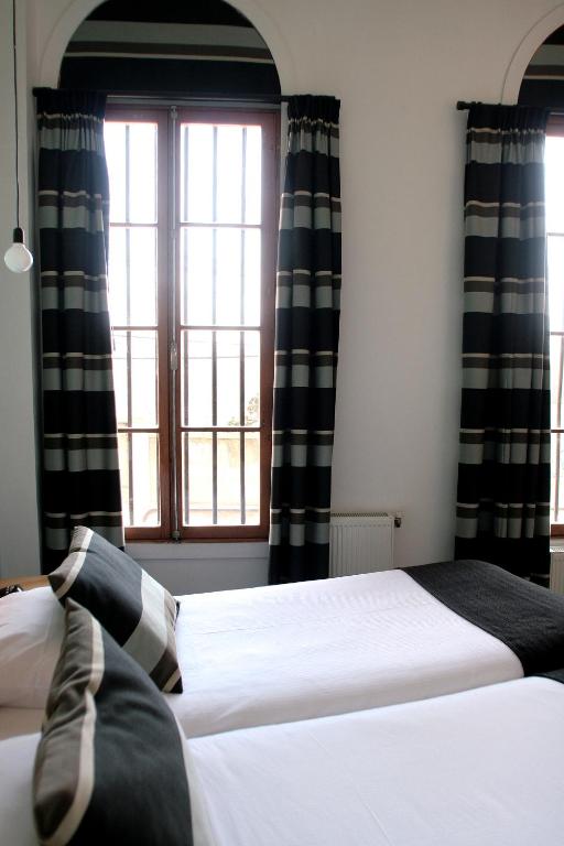 Postel nebo postele na pokoji v ubytování Hotel Ultramar