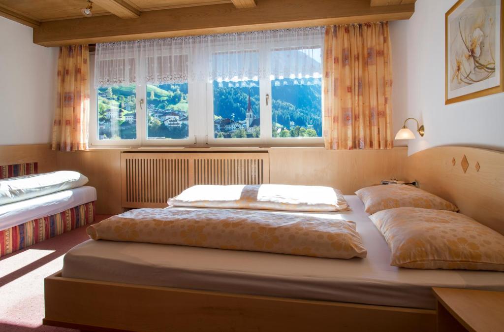 Postel nebo postele na pokoji v ubytování Residence Königsrainer