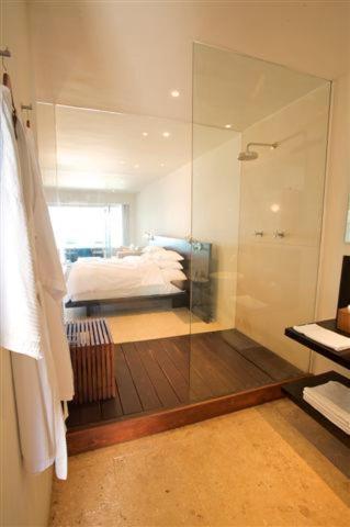 Postel nebo postele na pokoji v ubytování Hotel Secreto