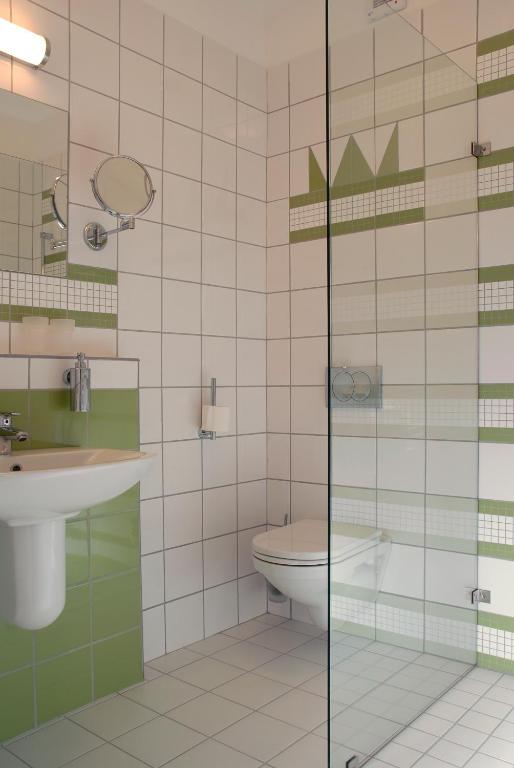 Kúpeľňa v ubytovaní Gokart Hotel