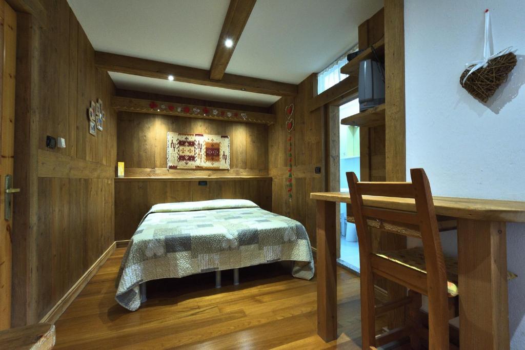 Postel nebo postele na pokoji v ubytování Hotel Paradisia