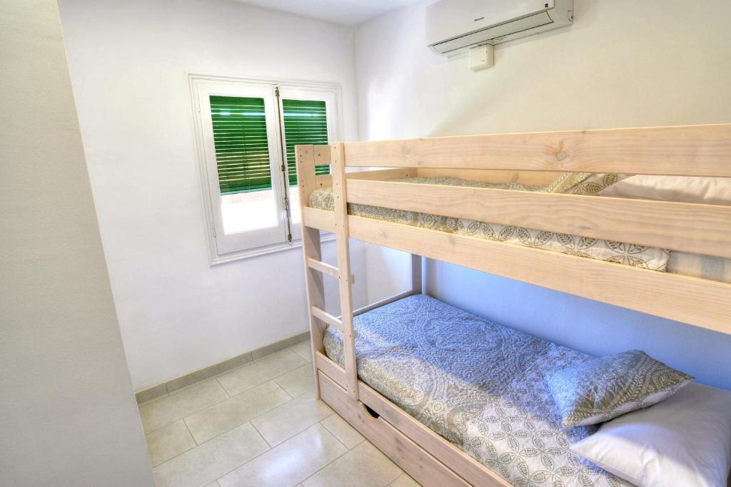 Posteľ alebo postele v izbe v ubytovaní Masia Cal Ros
