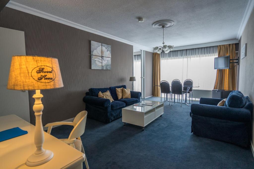 Posezení v ubytování First Euroflat Hotel
