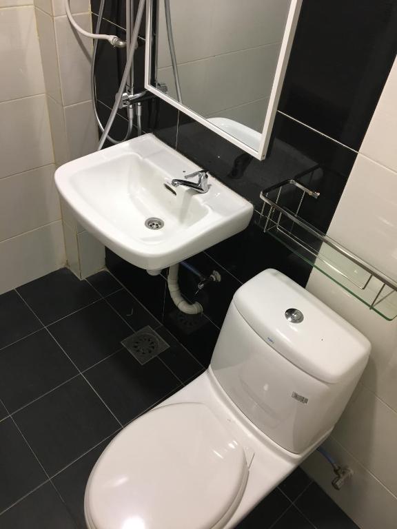 Koupelna v ubytování H Hotel