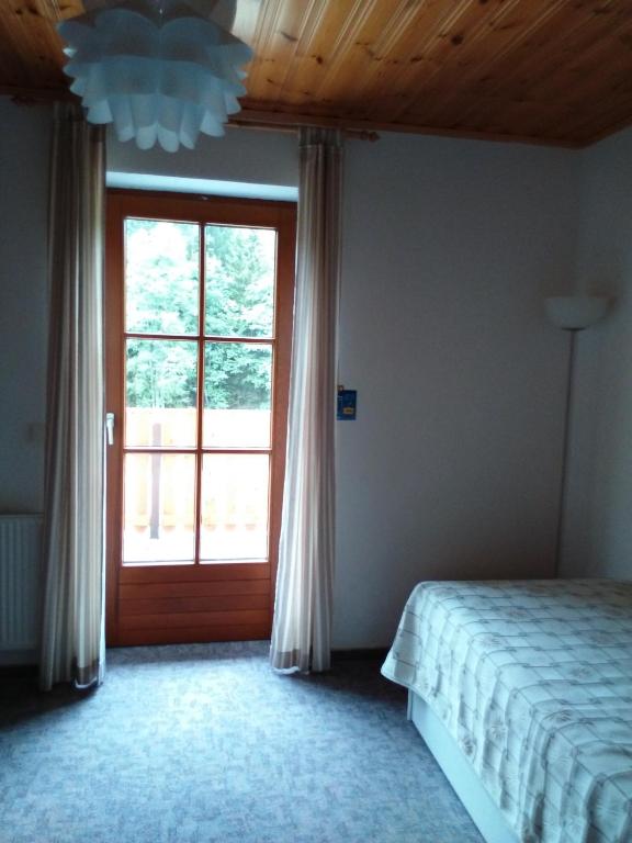 Postel nebo postele na pokoji v ubytování Hotel Sonnenhof