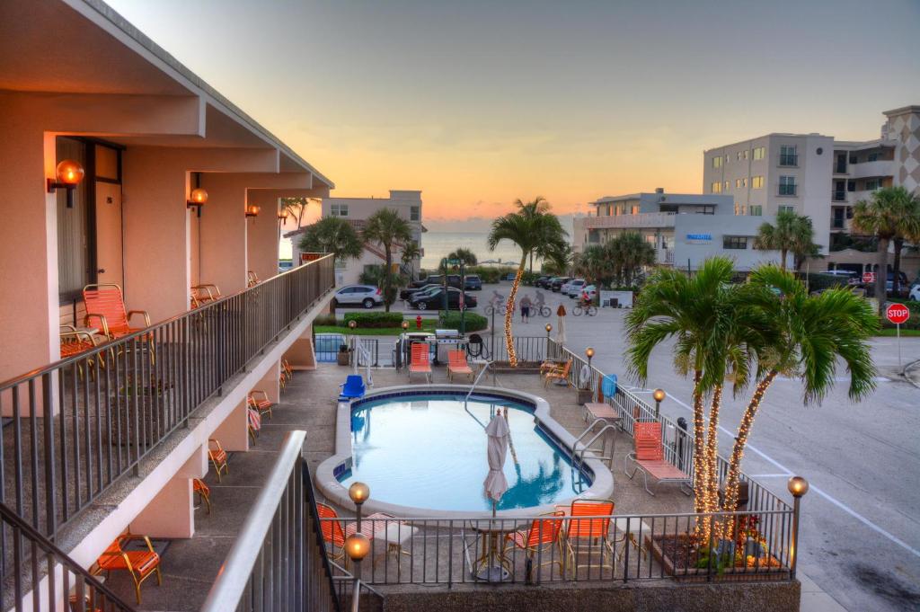 a view of a pool from a balcony of a hotel at Sea Cliff Hotel in Fort Lauderdale