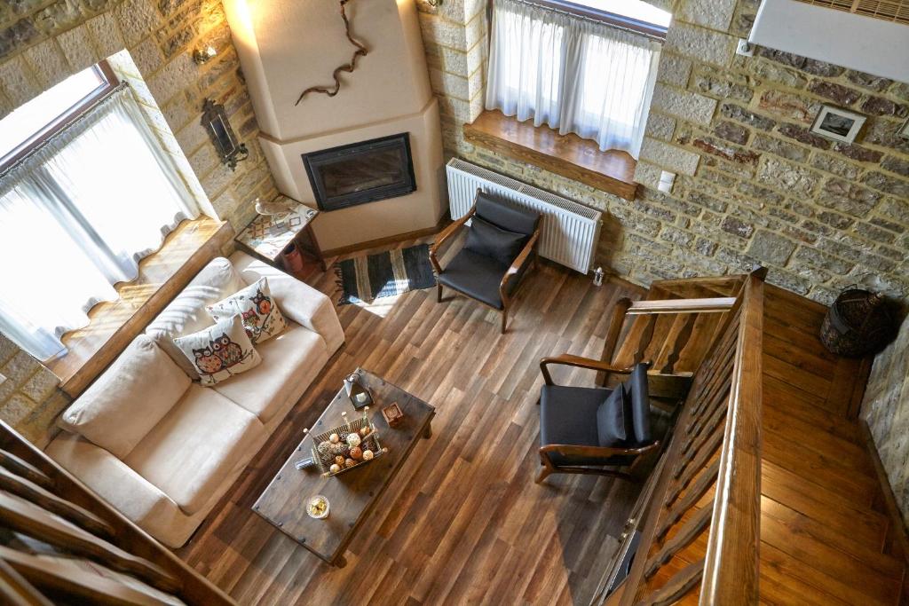 an overhead view of a living room with a couch at Guesthouse Amalia in Kalesménon