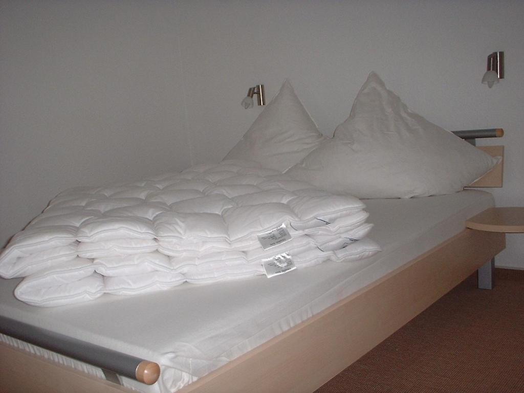 Postel nebo postele na pokoji v ubytování Haus Conwind