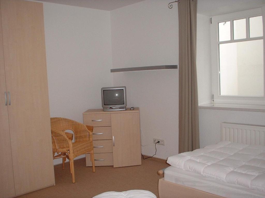 Postel nebo postele na pokoji v ubytování Haus Conwind